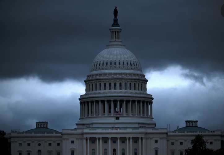US government shutdown, federal layoffs, Trump administration, federal employees, Reduction in Force (RIF), government funding, AFGE, AFSCME, Senate Democrats, Russell Vought, John Thune, federal paychecks.